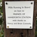 Plaque commemorating the loan of the sign