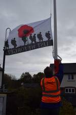 Hoisting a Lest We Forget flag November 2018