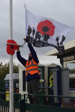 Raising a "Lest We Forget" flag, in November 2018